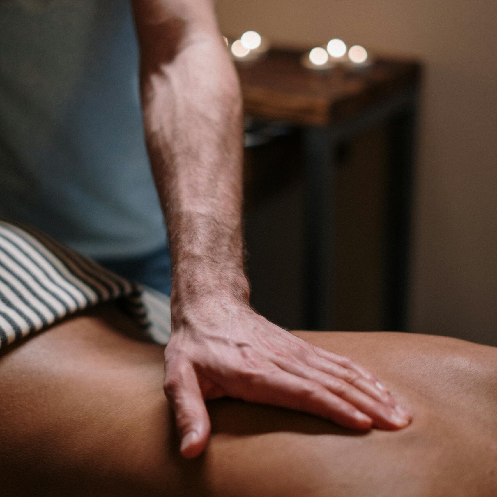 Soothing massage therapy focusing on relaxation and wellbeing in a calm spa setting.
